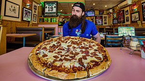 1.7M views · 34K reactions | They call this 'The Meat Lover Challenge'...presumably because there's a lot of meat on there...and it's only been beaten three times in the last five years! A few months back I dropped by Pizza Spano to find out just how tricky this thing is. A free meal and a snazzy t-shirt are the incentives... | Beard Meats Food | Facebook