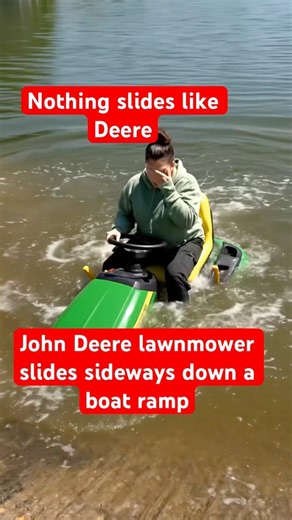 John Deere lawnmower, slides down a boat ramp and sinks #johndeere #boatrampfails ￼