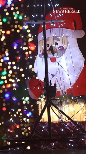 Showers pass and spirits rise at Panama City's Christmas parade rolls on Sunday, December 7 | Panama City News Herald