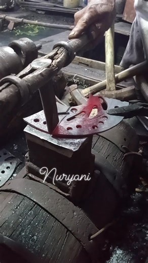 This is the process of a blacksmith cutting a motorcycle disc before it is made into a farming tool manually. #blacksmith #metalwork #craftsmanship #handmade #unitedstatesusironsteelworks | Nur Yani