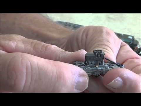 N Scale Kato SD70ACe How the heck do I get the truck in and out ?