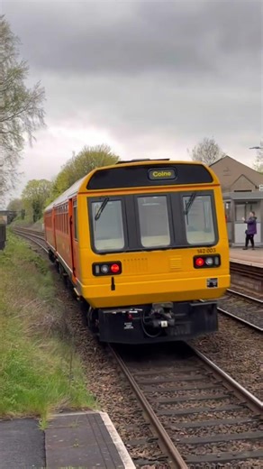 Pacer(class 142) speeding through Clitheroe on its way to Crewe.