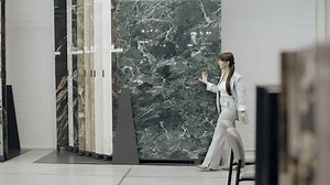 clip-3515981413-tile-salon-designer-browsing-marble-samples