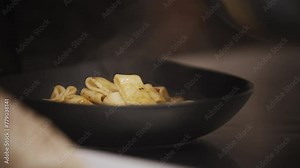 Chef is finishing a gourmet meal, beautiful plate, colorful plate, French chef cooking vegetables in a Gastronomic restaurant.