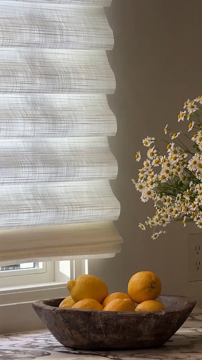Tailored. Timeless. Totally modern. Vignette® Roman Shades add softness and structure. Click to learn more. https://www.cwdblinds.com/hunter-douglas/shades/roman-shades/vignette | Creative Window Designs