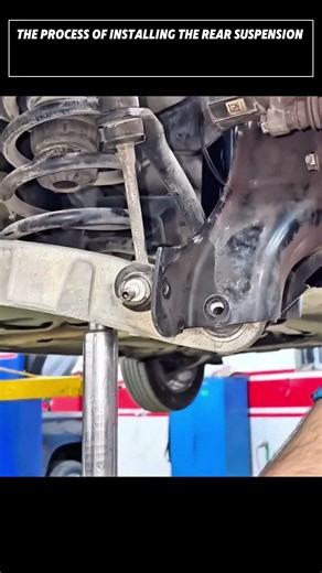The process of installing the rear suspension assembly for Nissan car