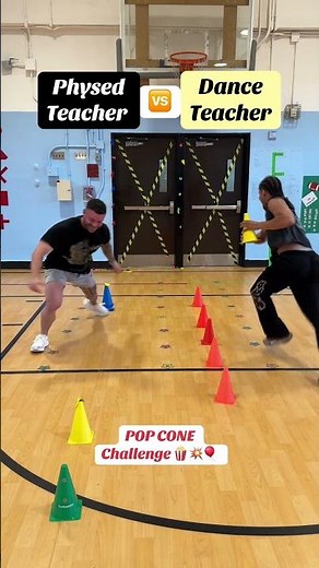 Teachers Compete in a Fun Pop Cone Challenge in the Gym