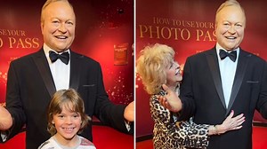 Emotional Patti Newton poses with late husband Bert's figure