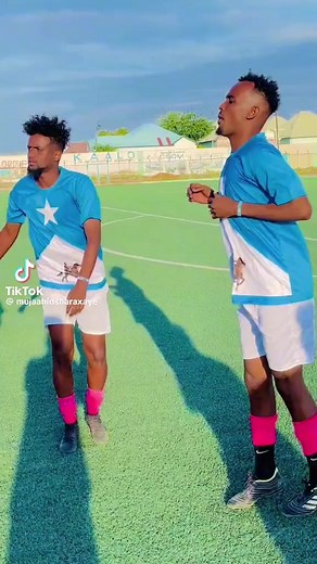 Dynamic Dance Routines on Turf with Colorful Attire