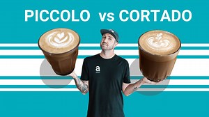What’s the Difference Between a Piccolo and a Cortado? Ever wondered what sets a cortado apart from a piccolo? These two milk-based espresso drinks may look similar, but they have distinct differences that highlight their unique origins and flavor profiles. A cortado, with its Spanish roots, is all about balance, featuring a 1:1 ratio of coffee to milk—typically served in a 120ml glass with a double shot of espresso and minimal froth. In contrast, the piccolo, an Australian creation despite its 