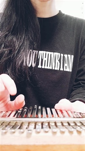 Kiyoshi on Instagram: "Messing around with a kalimba 😆 Such a cute and relaxing sound… The song is "Hataraku Kuruma," a HUGE hit with kids in Japan 🚗✨ PS: Have you received your Kiyo-Hoodie? Thank you so much for all the orders! Hope you like it!"