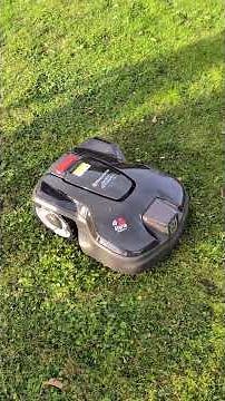 Husqvarna Automower robotic lawnmower AM 305 installed in bright sunshine, with cable!