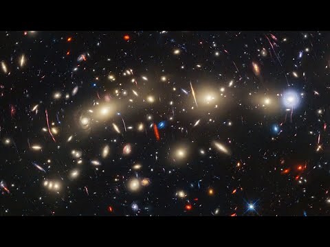 Webb and Hubble telescopes deliver mind-boggling view of huge galaxy cluster