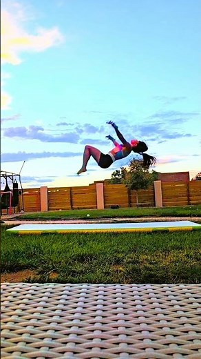 Back handspring back tuck at sunset 🌅 #gymnast #slowmotion #sunset