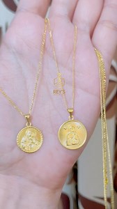 22K views · 27 reactions | Bestseller religious pendants in Figaro and Cadena Slim Chain #18ksaudigold #goldnecklace #giftforher | Rey's Jewelry Box - 2nd Branch | Facebook