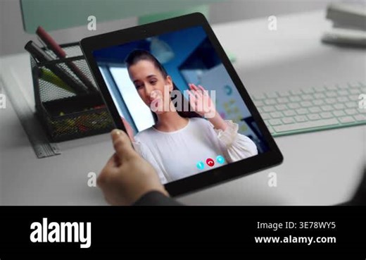 Office employee tablet calling to lady colleague at company workplace closeup. Unknown manager have virtual meeting with client. Smiling girl talking to coworker by web chat. Distant communication Stock Video Footage - Alamy