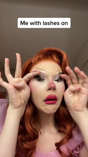 Showcasing Style: Playful Hand Gestures and Eyelashes