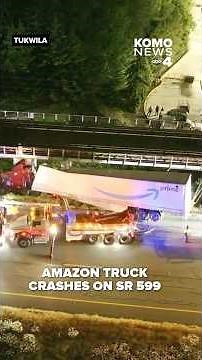 Amazon semi-truck crashes off SR 599 in Tukwila, hits light rail tracks above