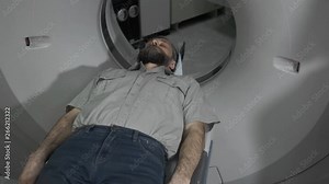 Male Patient On The Ct Or Mri Scanner Machine During X-Ray Process, Crane Shot. 4k