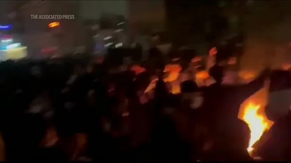 Death toll in crackdown on protests in Iran spikes, activists say - AP Explains