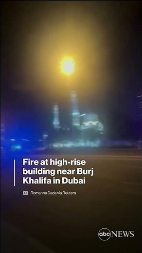 Fire races up high-rise near world's tallest building l ABC News