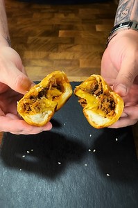 Are you ready for pulled pork bombs! CJ brings you another amazing bomb recipe! Adding sweet and smokey pulled pork to some crispy onions and cheddar cheese, wrapped all up in a butter biscuit, make these little bits of heavy! What are you putting in your bombs? | Cooking with CJ