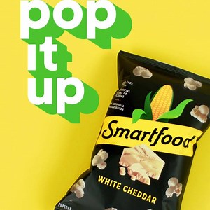 Air-popped popcorn tossed in delicious white cheddar cheese. It's okay to hug this bag. No one will judge. 🌽🍿 | Smartfood