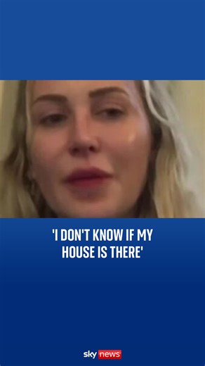 TV personality Stephanie Pratt becomes emotional while talking of family and home close to Los Angeles wildfires. | Sky News