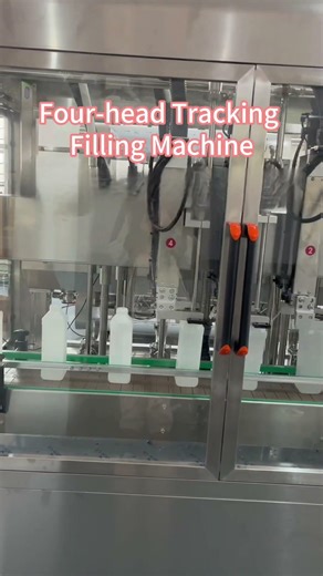 Four Head Tracking Filling Machine | Continuous High-Speed Liquid Filling Solution