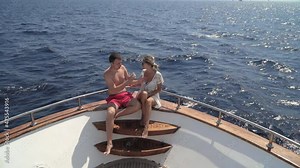 Beautiful couple enjoying on the yacht on their romantic honeymoon Stock Video