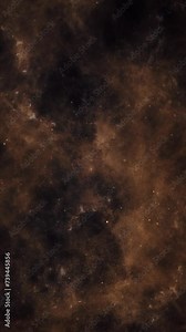 Vertical video - atmospheric outer space background with a galaxy of golden gas clouds, stars and space dust.