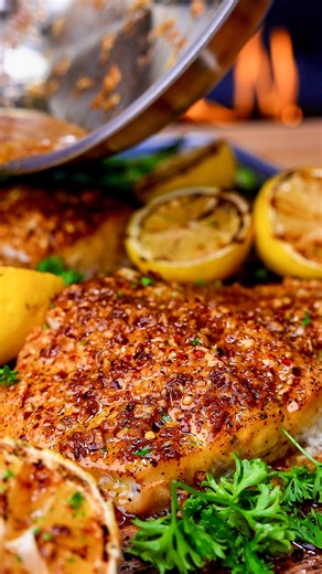 Ryan Carter 🍻 on Instagram: "Grilled halibut cooked on a cedar plank and finished with garlic lemon sauce. Recipe below. INGREDIENTS Makes 4 servings HALIBUT + 2 lbs halibut (about 4 x 8 oz fillets, skin-on) + 1 TBSP minced dried onion + 3/4 tsp garlic powder + 2 tsp kosher salt + 1 tsp coarse black pepper + 1/2 tsp crushed red pepper flakes + Neutral oil + 2 TBSP fresh parsley, chopped (for garnish) GARLIC LEMON SAUCE + 3 cloves fresh garlic, minced + 1 lemon, juiced (about 2 TBSP) + Zest of 1