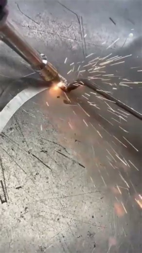 forging a sharp curved scythe blade using a welding torch