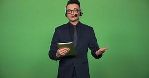 Newscaster with Tablet and Headset