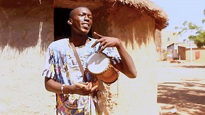 1.1K views · 208 reactions | In this video, former student Adama plays the #Tama, a traditional talking drum from Mali taught at École de Musique de Kirina. Most talking drums sound like a human humming depending on the way they are played. Adama is now a member of the "Kirina Lolow" band. Watch their latest video clip "Kirina Jarabi" here: https://www.youtube.com/watch?v=WbhBoZsZylQ #PercussionWeek #CulturalHeritage | Playing For Change Foundation | Facebook