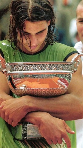 Vintage Court Collection on Instagram: "Rafael Nadal’s photoshoot after winning his first Roland Garros title (2005) The 19-year-old Spaniard claimed his first Grand Slam title with a gritty 6-7, 6-3, 6-1, 7-5 win over Mariano Puerta. #vintagetennis #rafanadal #rolandgarros"
