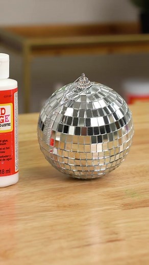 Transform basic disco ball ornaments into shimmering, magical fun with this Mod Podge and food coloring hack! These DIY ornaments work great for Christmas or sparkly New Years party decor. We love the versatility! 🪩✨ #modpodge #modpodgecrafts #discoball #learnontiktok #foodcoloringhack You can order Mod Podge Gloss online or find it at your favorite crafty retailers like Michaels, Walmart, & Hobby Lobby!