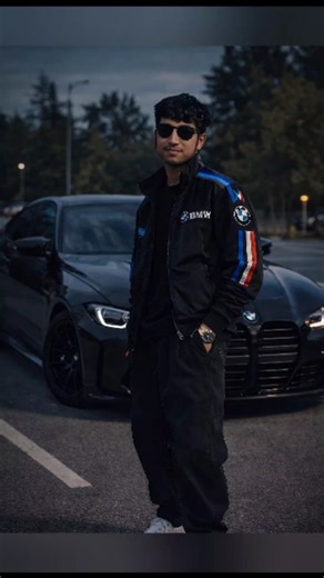 Neeju🥷 🥷 on Instagram: "Comment 🙌 for prompt . . . . . . #tbt #prompt #Bayerische #bmw #viralreels Hey there! Thanks for commenting 🙌 Here’s the link I mentioned ⬇️ Preserve My face 100% "action": "dalle.textim", "action_input": "{ "prompt": "A stylish young man with messy dark hair, resembling the person in the reference image, standing confidently in front of a red BMW sports car in an outdoor parking lot. He is wearing a black BMW racing jacket with blue and white detailing, black baggy p