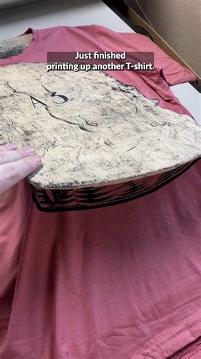 Printing another Everything Burger shirt on smoked paprika! This is one of my favorite designs! All my shirts can be found at www.NooshStudios.bigcartel.com and if you didn''t know all my shirts ship free! #printmaking #printmaker #tshirt #artist #shirt #burger #food #fun #design #tshirt | Noosh Studios