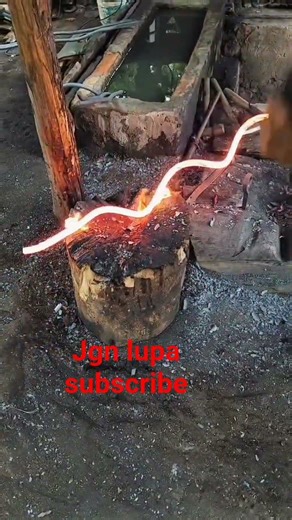 the manual process of pulling the shells carried out by traditional blacksmiths