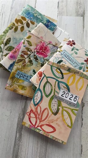 Tiffany Sharpe on Instagram: "I’m all set up with an entire year of mixed media planners for 2026! This set of covers are made with my watercolor designs on rice paper from @joggles! The rice papers will be available at the end of January. Yes, I’ll be sharing how I made the covers, it’s super simple! #joggles #mixedmediaplanner #ricepaper"