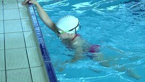 Swim Finish. Slow Motion of Young Woman Swimmer Practicing Freestyle in Swimming Pool Stock Footage - Video of child, health: 159650442