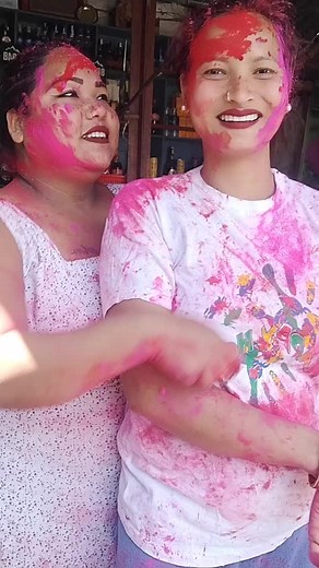 Playful Powder Fight Moments in Colorful Attire