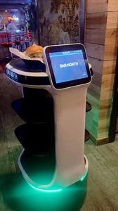 12K views · 276 reactions | Please join us in welcoming Gunner, our newest robot employee, who will be responsible for delivering food to our customers when it gets a little hectic This will allow our servers and bartenders to devote more time to engage with our customers and delivering outstanding service! Gunner delivered Gary’s meal perfectly to the right spot. ❤️邏 | Bridgestone Bar & Grill | Facebook