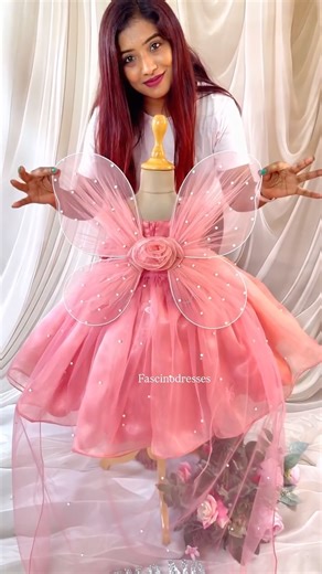 N Shiny Nithya on Instagram: "Beautiful peach birthday princess ballgowns with detachable butterfly wings and trail with baby name from #fascinodresses ✨️ Wats app or inbox to order 9840874121 Can be customized in any color/size ✨️ We ship worldwide 🌐 🌎 ✨ Custom-Made Luxury Dresses for Women, Kids & Families ✨ From first birthdays to family weddings — we craft your dream outfit in your color, your size 💜 🎀 Baby Frocks | Panel Ballgowns | Mom & Daughter Combos | Custom Sarees | bridals |first