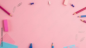 Stop motion animation of pen, sticky note, notepad, marker, eraser, push pins, paper clip pencils on pink background. Flat lay top view. Education template back to school and online study concept