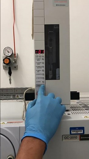 Installing spool in the Auto injector AOC-20i (Shimadzu, Japan)