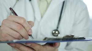 Doctor Writing Prescription