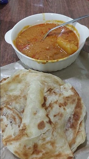 Roti Prata with Chicken Curry Sauce" Indian Food"