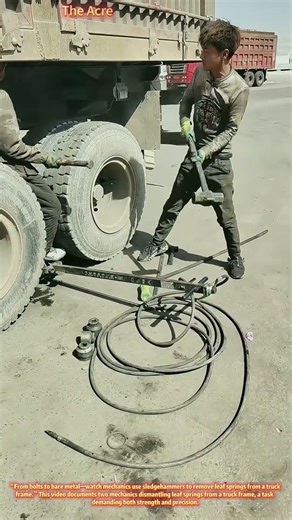 Breaking Down Truck Leaf Springs with a Sledgehammer